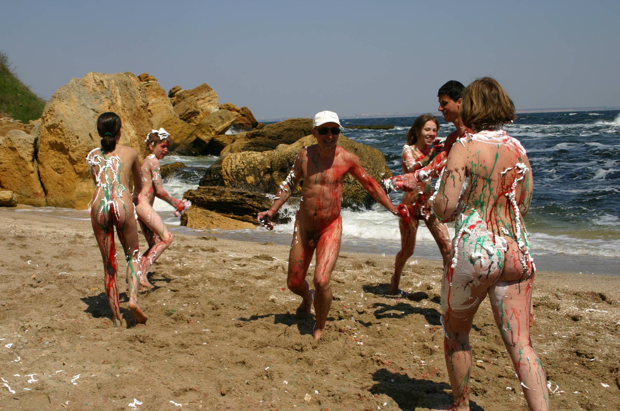 Nudist Photos Beach Paint Fight Actions - 1