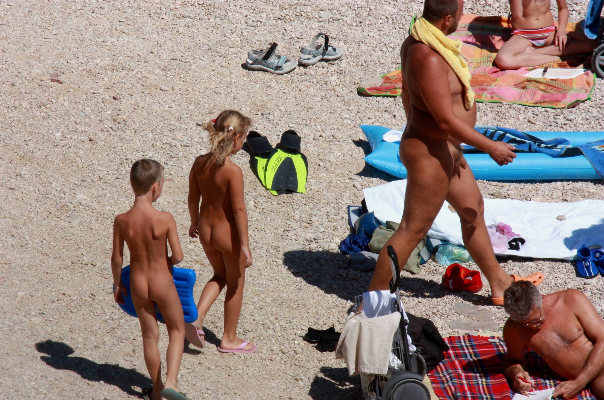 Nudist Pics Follow Nude Beach Family - 1